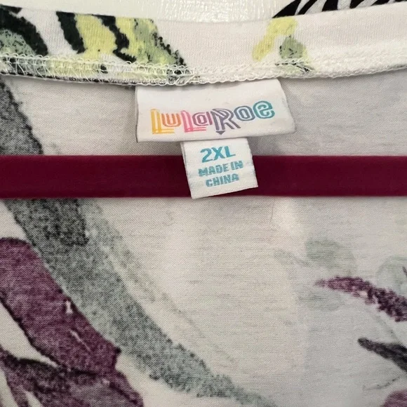 Pair of LuLaRoe v neck t shirts with longer hems. Floral and scroll - Picture 5 of 6